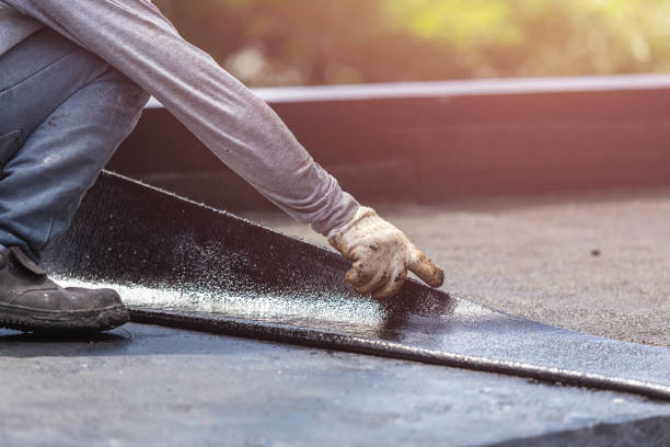 Professional Waterproofing technician working in Lawrenceburg, KY